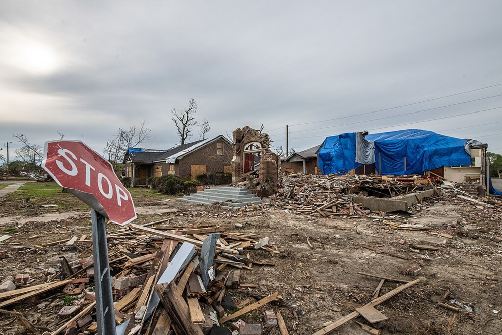 When a Forecaster Issues a Tornado Emergency: Insights from the Front Lines